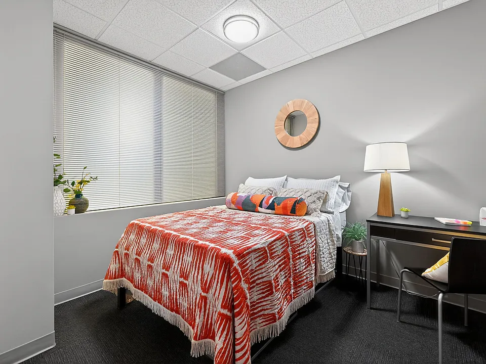 Cozy Carpeted A4 Bedroom at University Plaza NIU Off-Campus Apartments