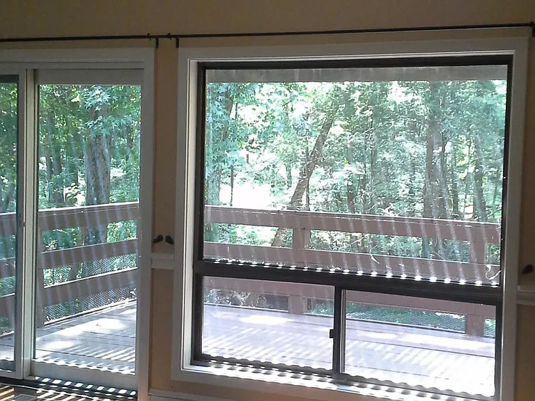 FAMILY ROOM OVERLOOKING DECK TO BACKYARD