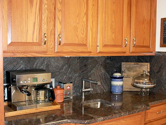 Coffee bar/pantry area adjacent to kitchen.