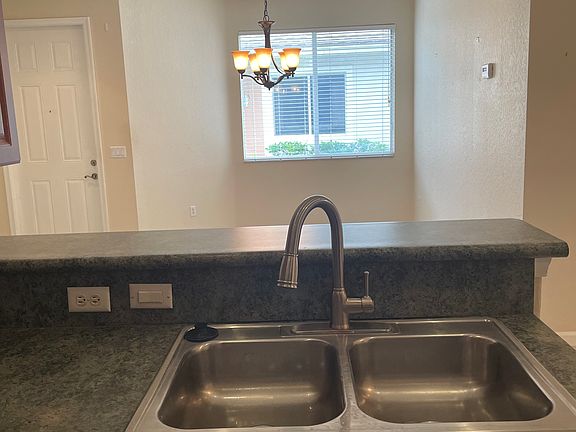 In kitchen looking out towards the dining room.