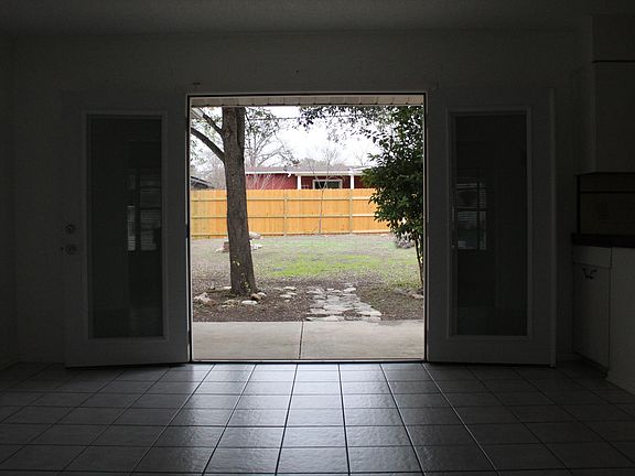 Dining room with new French doors that open to the backyard.