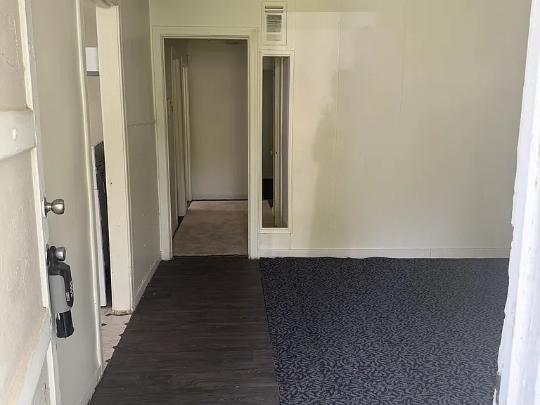 entrance way, hallway, and living room