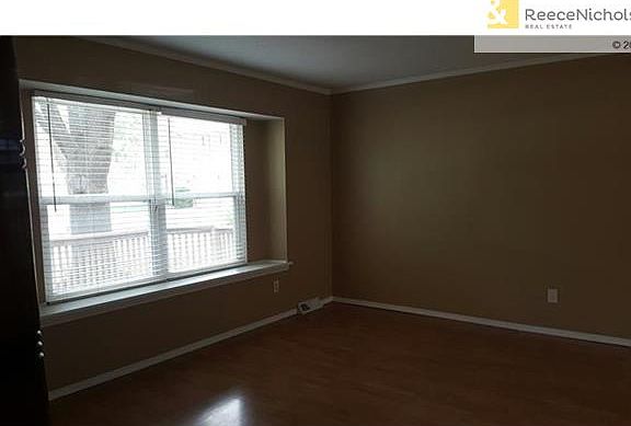 Large living room with bay window