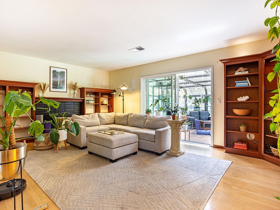 Bright living room with working fireplace.