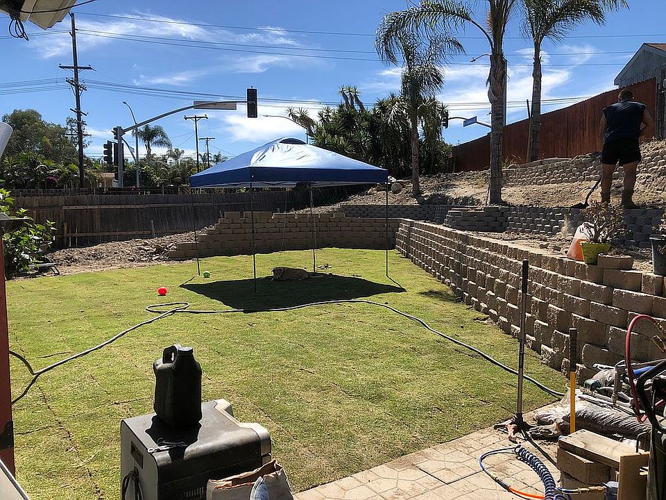 Yard retaining wall extended