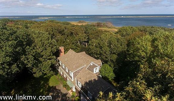 Ariel view of home/property and Sengekontacket Pond beyond