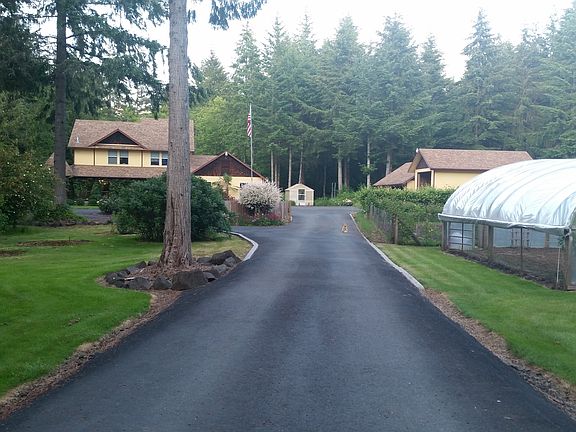 Paved driveway, view of home