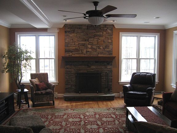 The stone fireplace in the 19'-6" x 19'-4" Great Room.