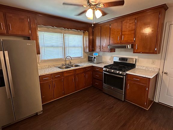 Kitchen with direct access to garage.