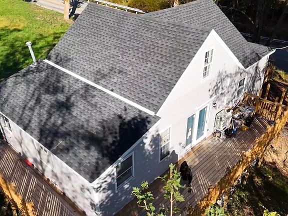 Bird eyes view of deck and rear of home