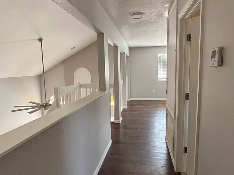 Hall way to secondary bedrooms