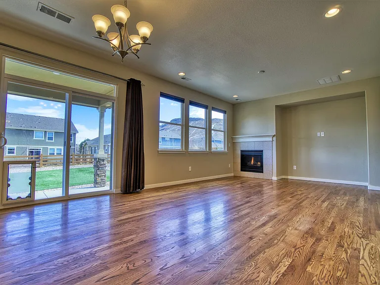 Main level - dining room (14' x 10') and family room with gas fireplace (14' x 14').