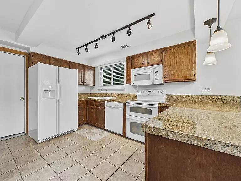 3544 S Ogden St — Photo 11
