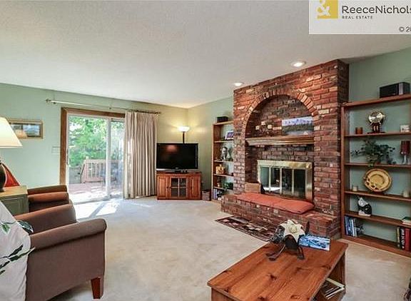 Large family room with sliding door access to deck and backyard.