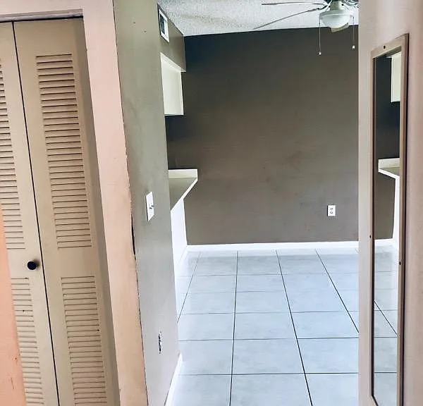 ALL TILED FLOORS IN WALK IN CLOSETS.