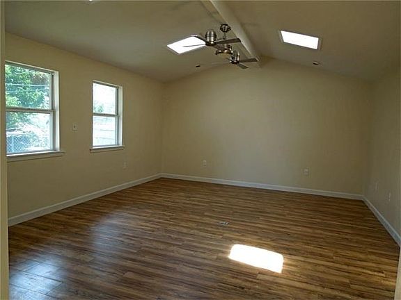 This is the extra large bonus room on the back. Make it whatever suits your needs. Door to patio is on the right.