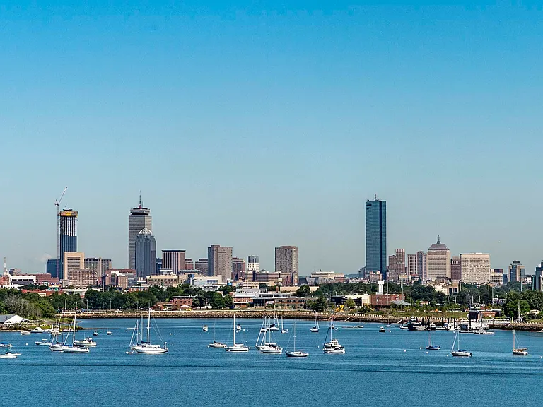 Wake up to breathtaking water and city skyline views every day