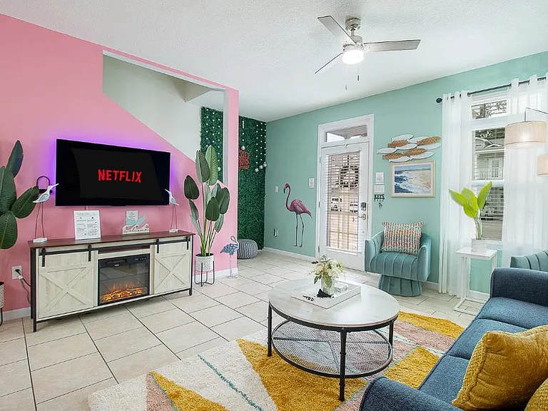 Step into our tropical beach-themed living room with Roku 55" Smart TV and Fireplace. Let the cares of the world melt away as you immerse yourself in a haven of tropical coastal tranquility.