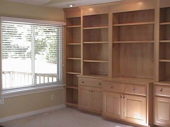 recessed lighting accenting custom entertainment center