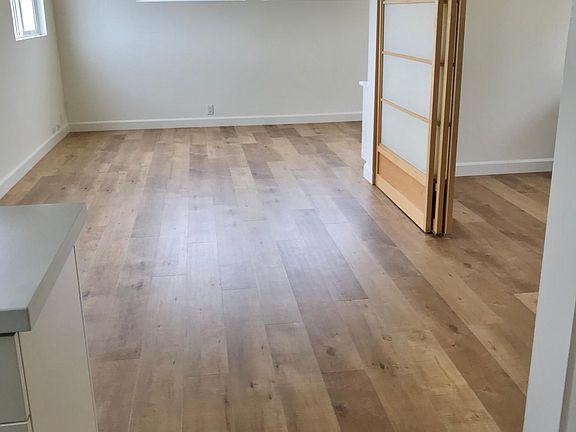 open floor plan, shoji doors close off bedrom