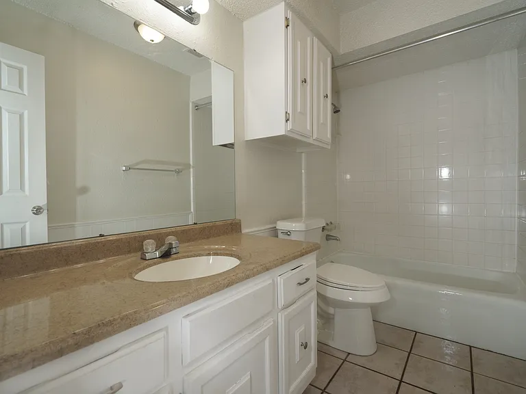 Bathroom: Clean and well-maintained with extra storage