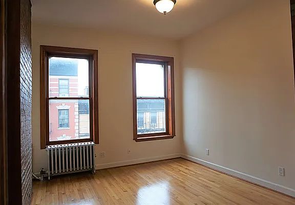 4th image of 114 E 7th St APT 16