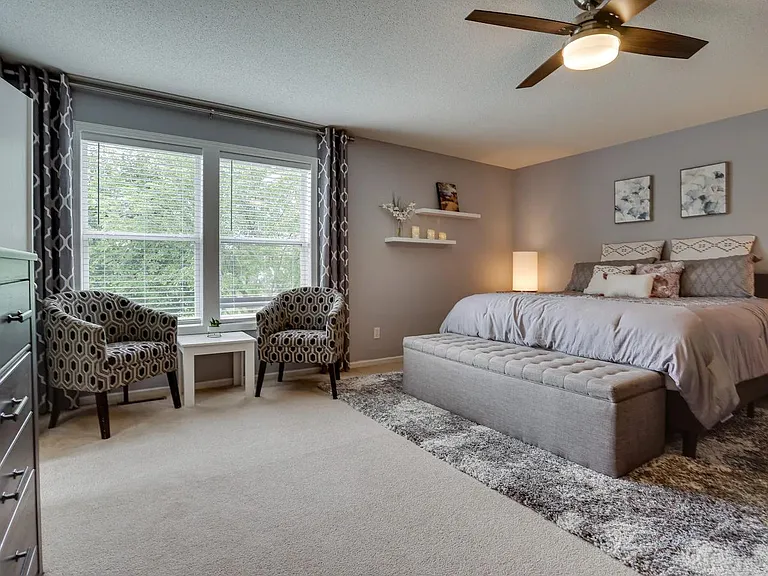 Master bedroom with private master bathroom and walk-in closet