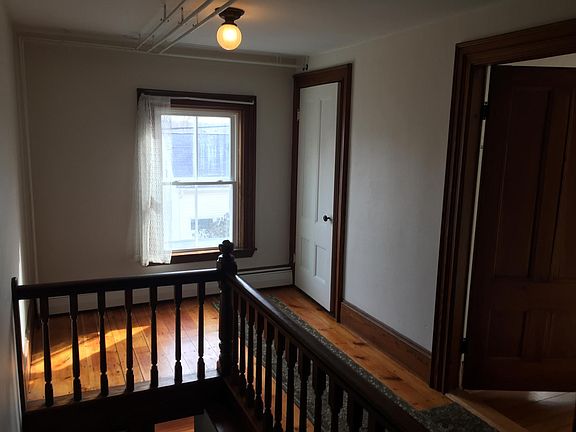 Upstairs hallway entrance into living room and dining room