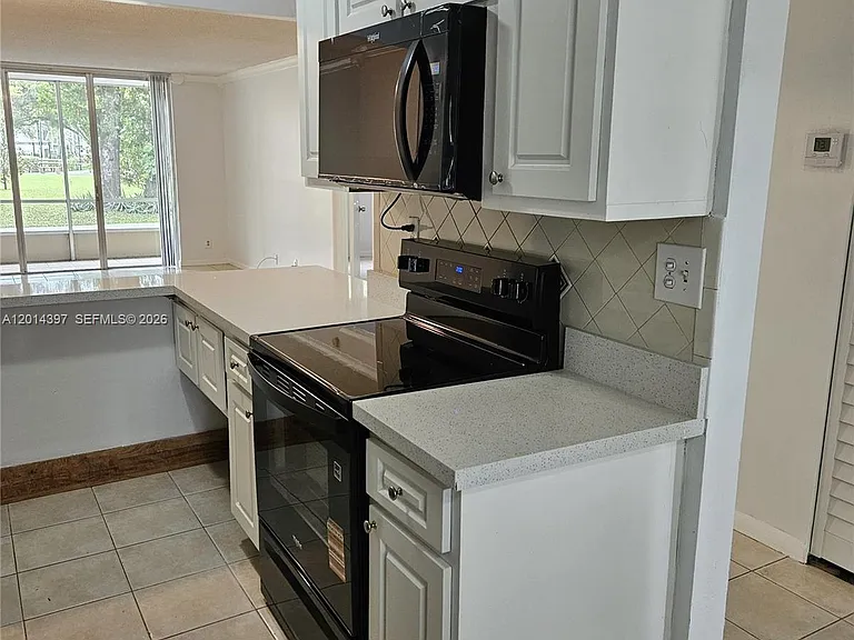 3070 NW 48th Ter #104 — Photo 3