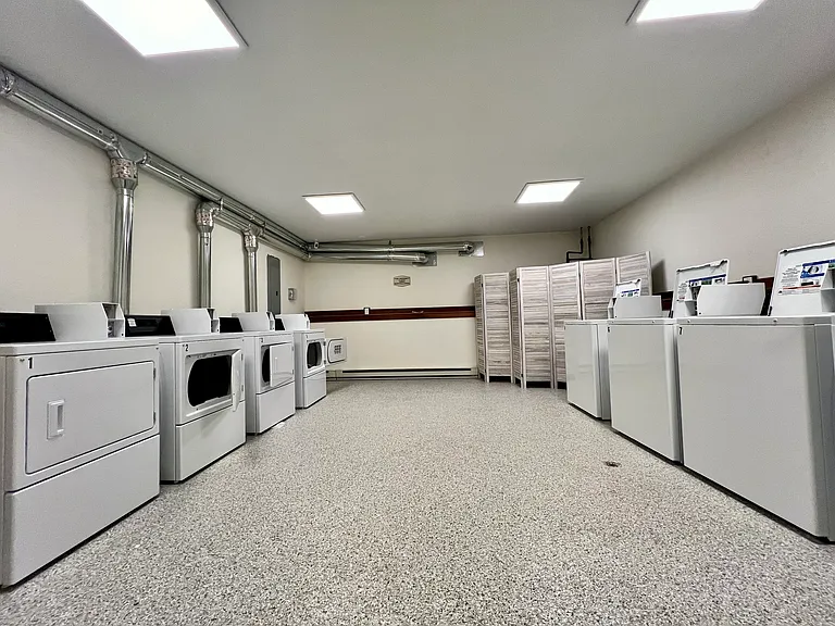 Shared Coin operated laundry room in building