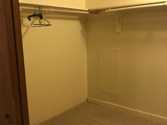 Walk in closet off of Master Bedroom