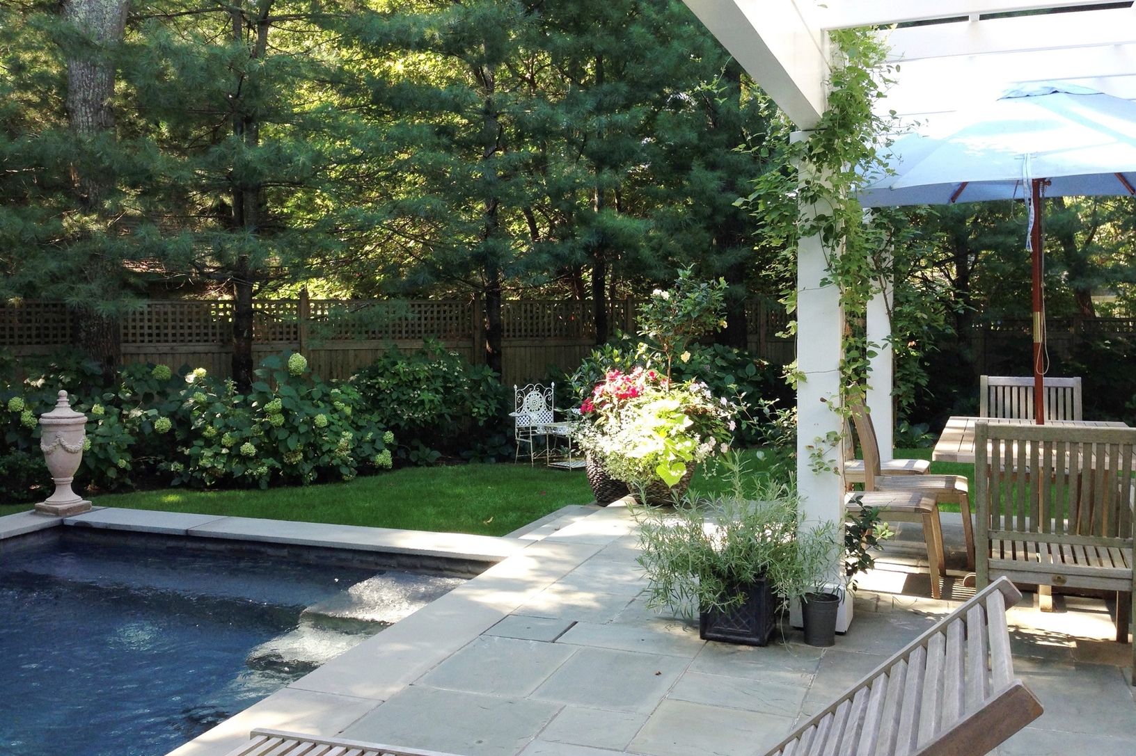 ELEGANT SLATE PATIO WITH PERGOLA
