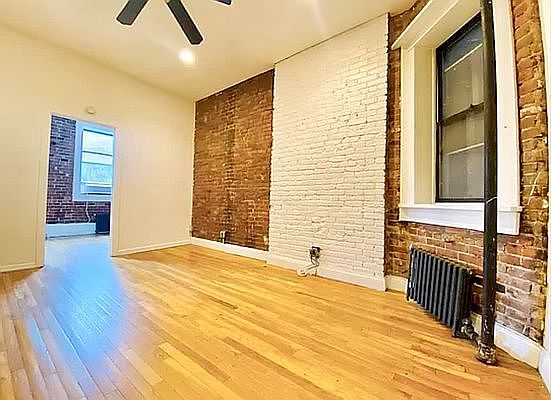 1st image of 248 E 3rd St APT 1