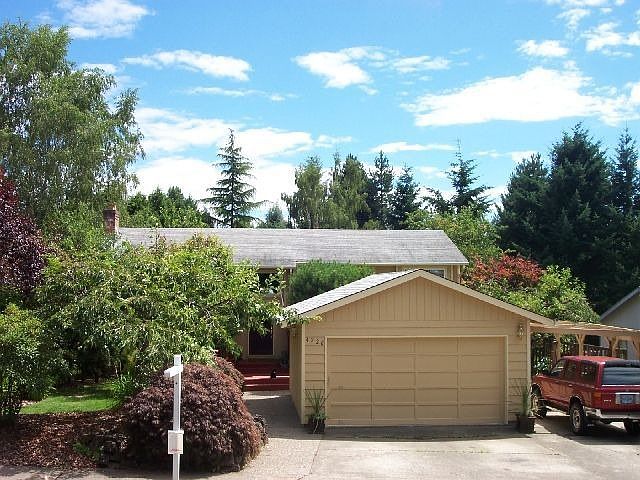Front view of home. Private oasis.