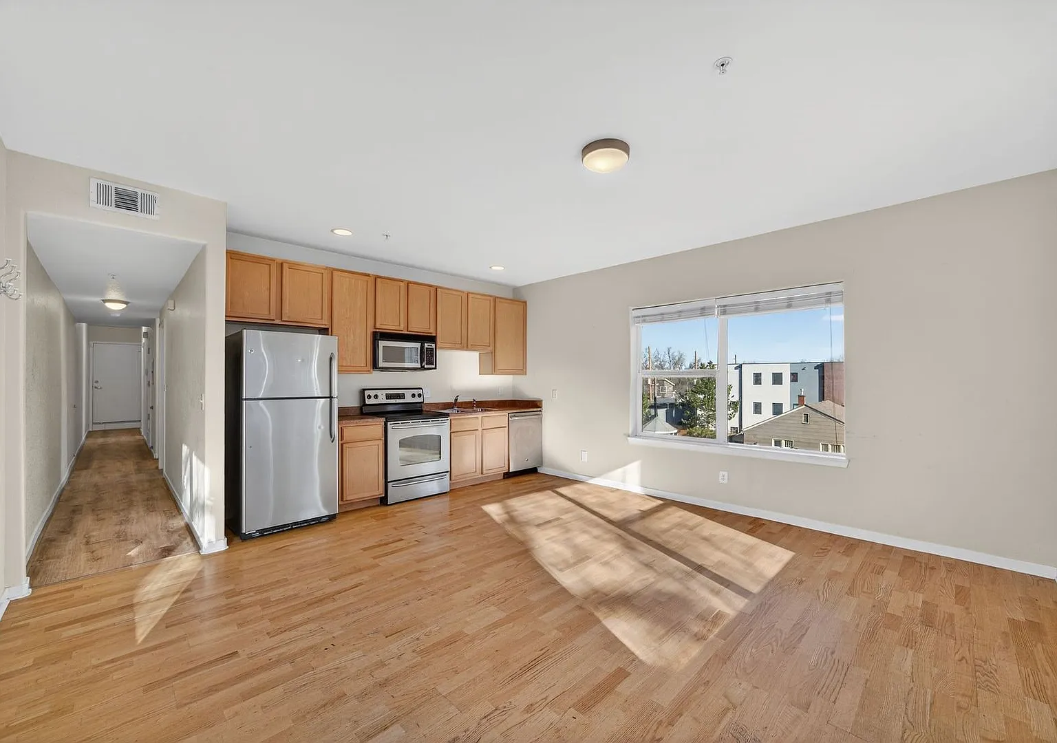 Sunlit 2 BR, 2 BA Condo Steps From Denver University w/ Covered Parking! — Photo 3