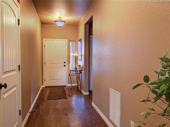 Welcoming front entry. Hardwood flooring.