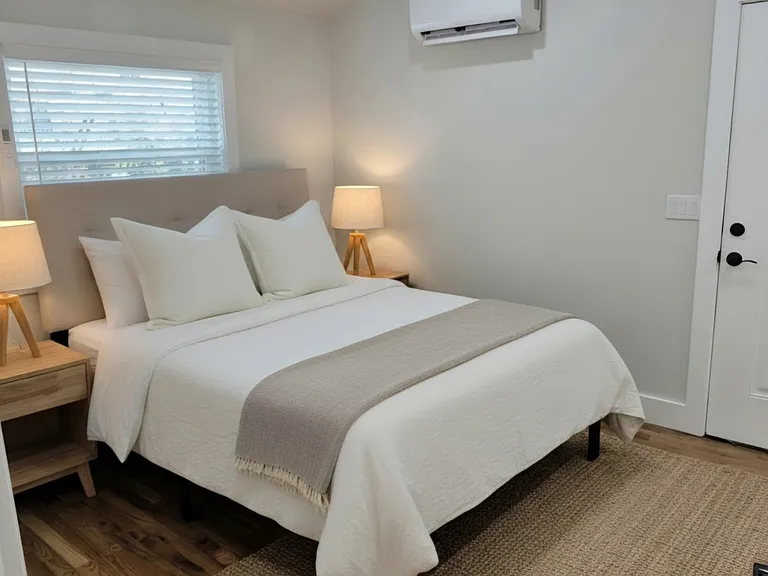 Bedroom #1- solid wood floors, walk in closet area with w/d.