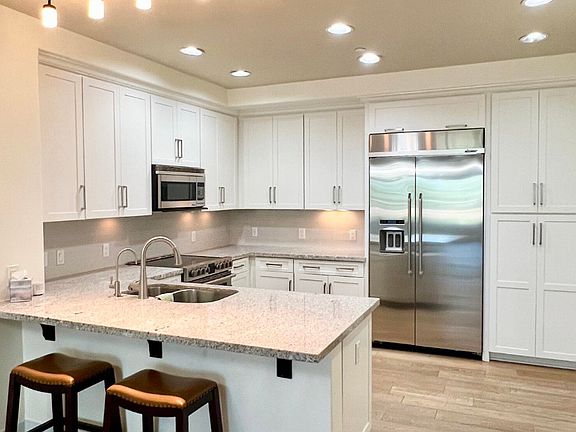 2nd image of 4803 N Woodmere Fairway Unit 1004
