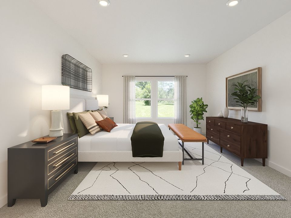 The primary suite offers a private retreat.