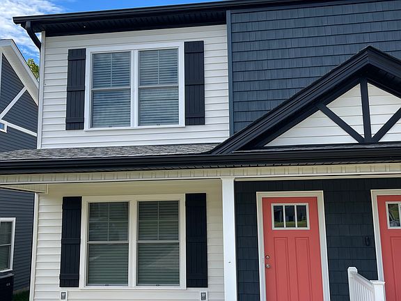 Large lighted front porch, covered entry