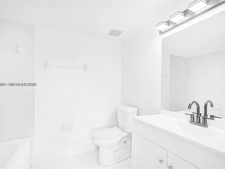 3398 NE 9th Dr #104 — Photo 8