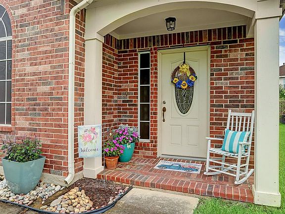 The cozy front porch is the perfect spot to enjoy your morning coffee before you start the day.