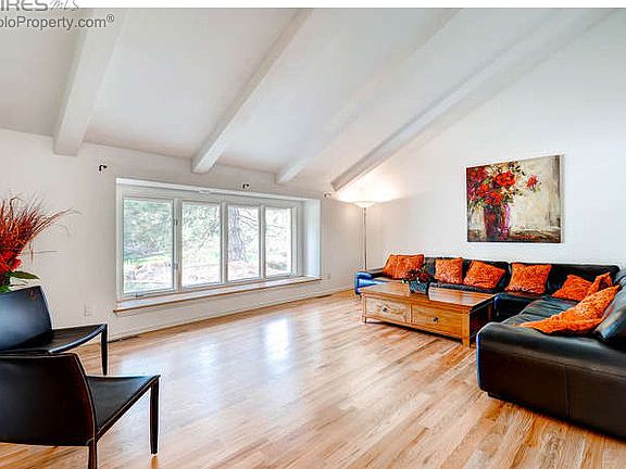 Sunny living room with vaulted ceilings