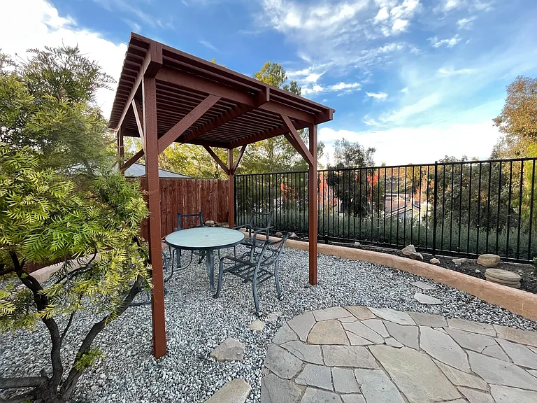 Enjoy your open views and morning cup of coffee under the pergola.