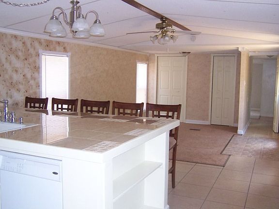 Kitchen opens into Living room