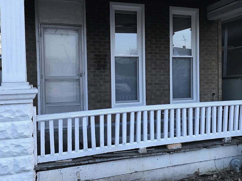 New windows at front of unit. Porch will be refinished.
