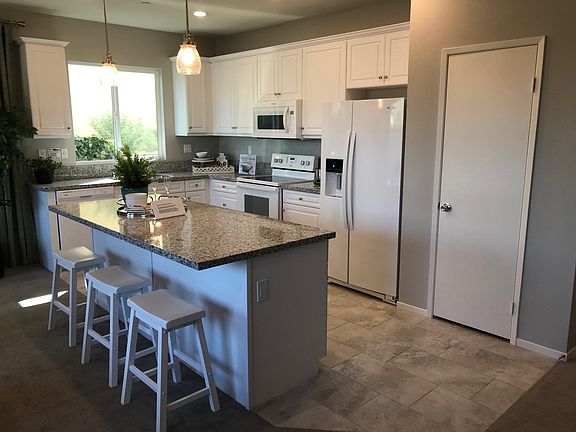 Kitchen with pantry closet.