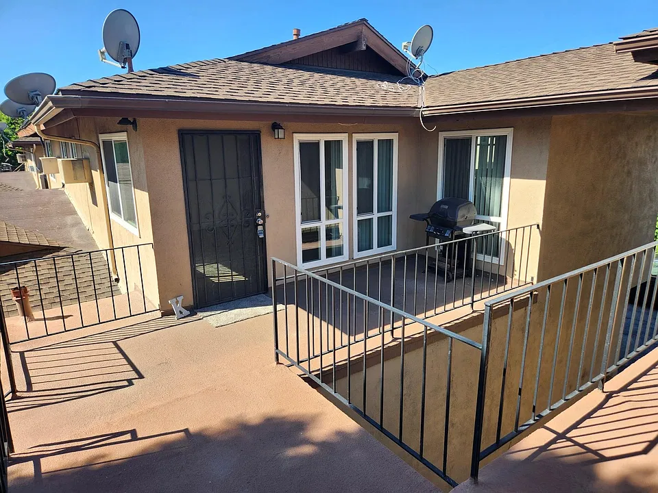 Upstairs 1 bedroom with it's own stairway and front balcony.