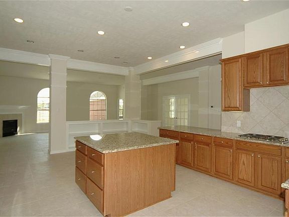Beautiful kitchen with tons of cabinet space, granite countertops, and a large pantry.