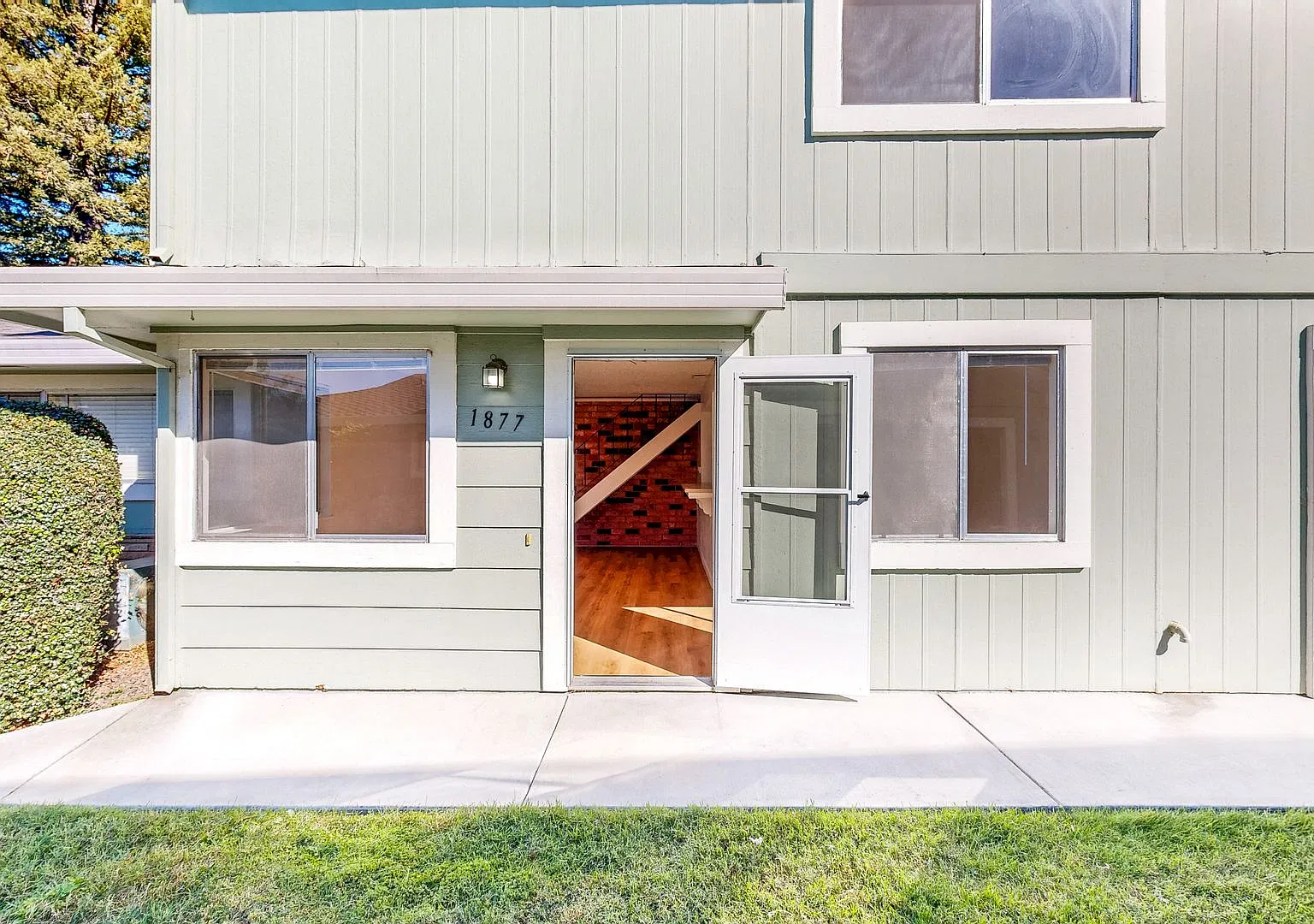 Lovely Two Bedroom One Bath Two Story Condo with Carport & Laundry Facility — Photo 3